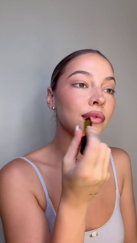 Instagram post by @madelyncline for Revlon. Caption reads: A vampy lip combo with @revlon for national....