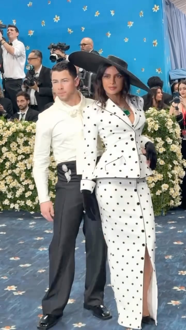 Instagram post by @whatsuppune for VOGUE India. Caption reads: Priyanka Chopra and Nick Jonas turned heads at the....