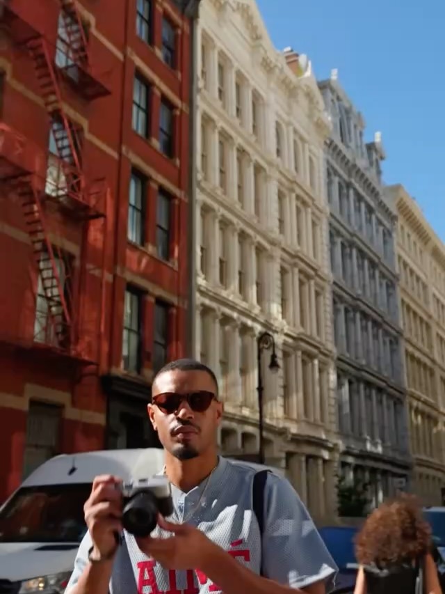 Instagram post by @marky_marc13 for OM SYSTEM. Caption reads: [...] a morning around New York with the OM SYSTEM....