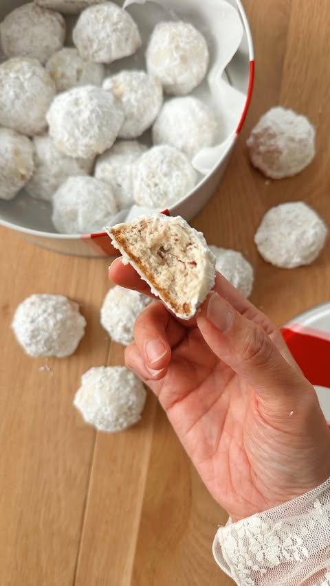 Instagram post by @jacquisaldana for Caraway Home. Caption reads: SNOWBALL COOKIES ❄️ A holiday cookie tradition....