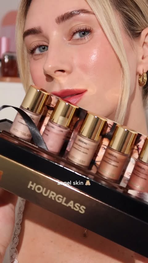 Instagram post by @babydewyou for Hourglass Cosmetics. Caption reads: Hourglass Cosmetics 👼🏼 UNREAL LIQUID HIGHLIGHTER....