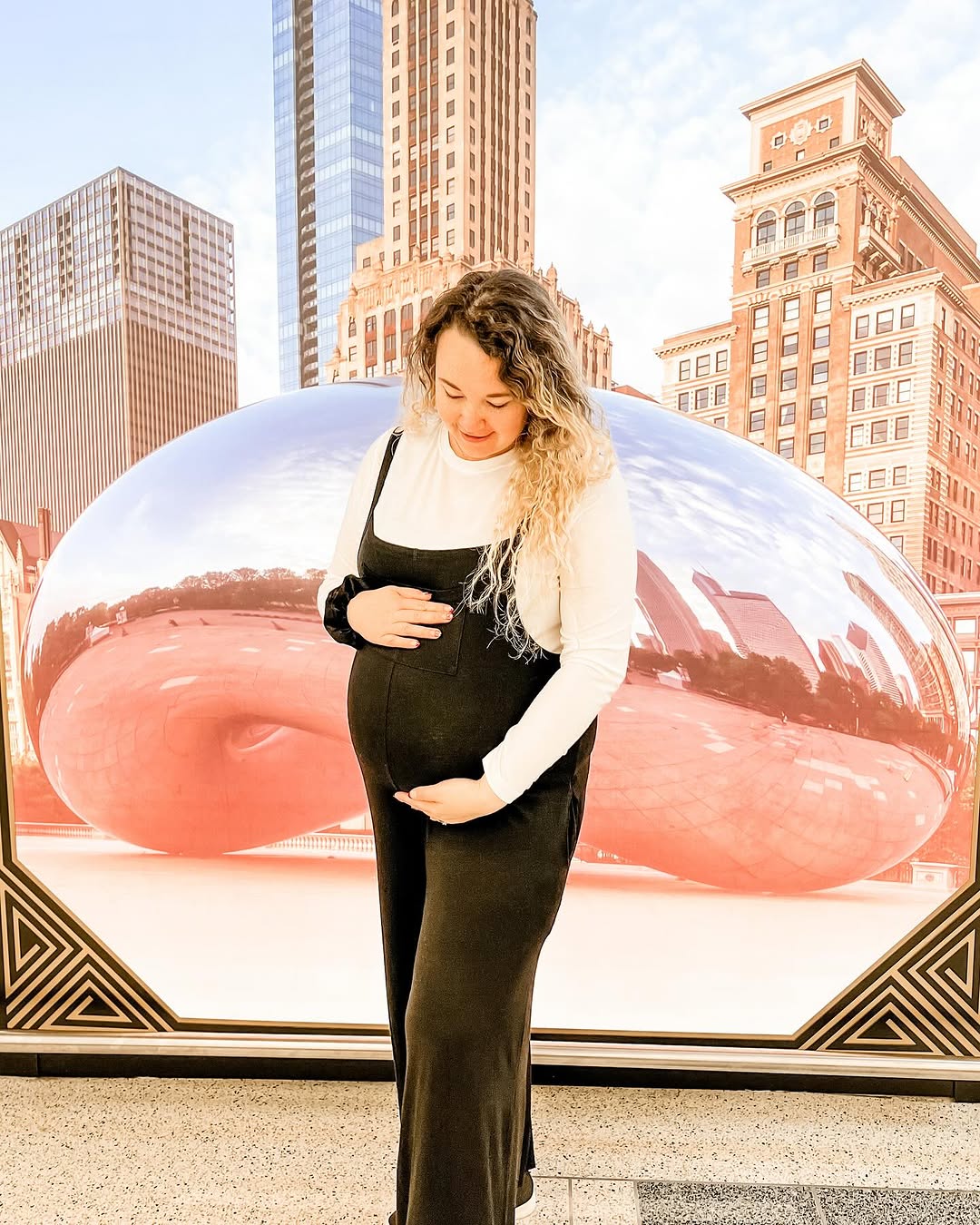 Instagram post by @nouuu_mom for shoppinkblush.com. Caption reads: we didn’t make it to see “the bean” in person on....