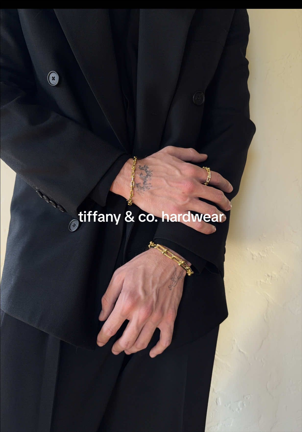 TikTok post by @ethancgaskill for Tiffany & Co.. Caption reads: am I pulling it off? @Tiffany&Co. #TiffanyHardWear....