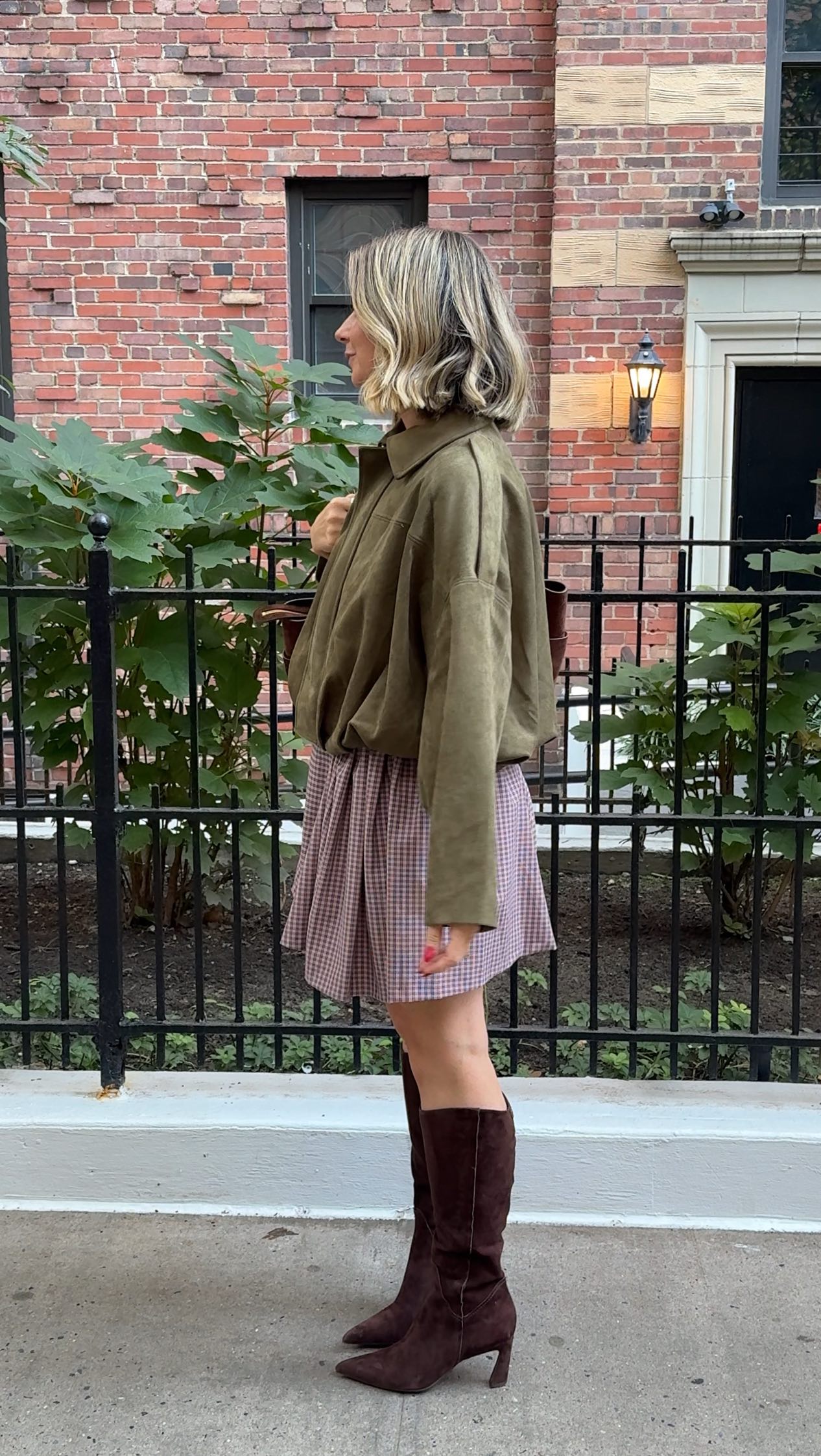 Instagram post by @lindseystackhouse_ for Famous Footwear. Caption reads: Just wrapped another year at NYFW with a few....