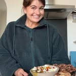 Instagram post by @saratane for Athleta. Caption reads: Making an easy marinated feta appetizer in....