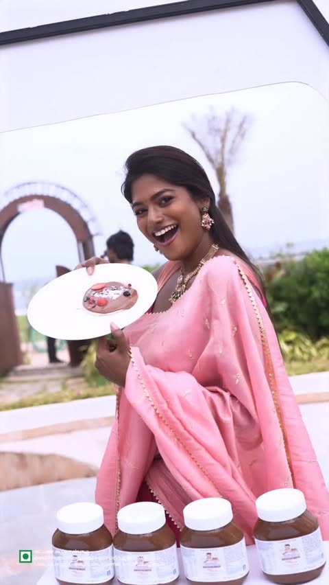 Instagram post by @vinusha_devi for Nutella. Caption reads: [...] the BEST time celebrating Pongal with....