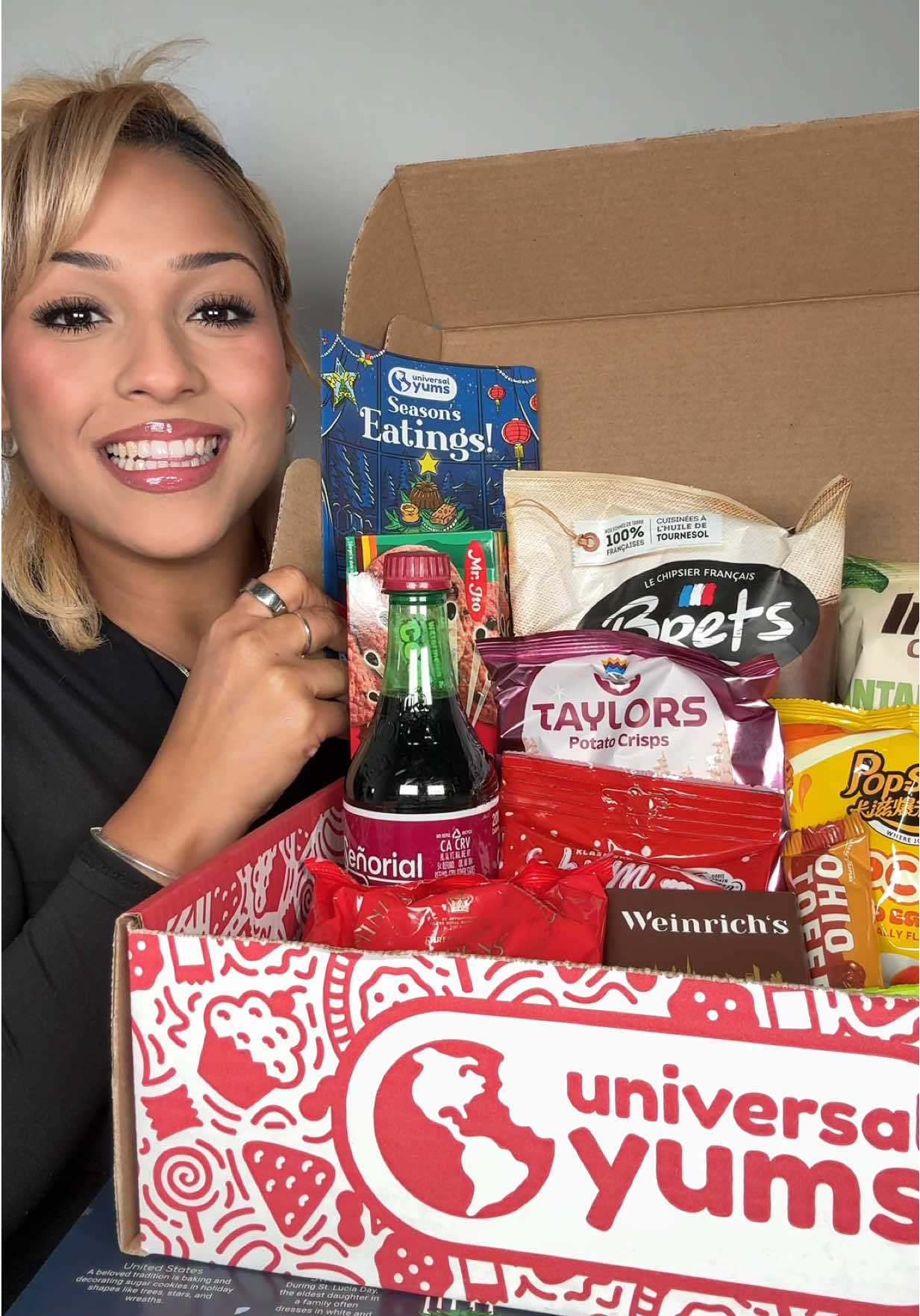 TikTok post by @cookitgirleats for Universal Yums. Caption reads: [...] snacks from around the globe with @Universal....