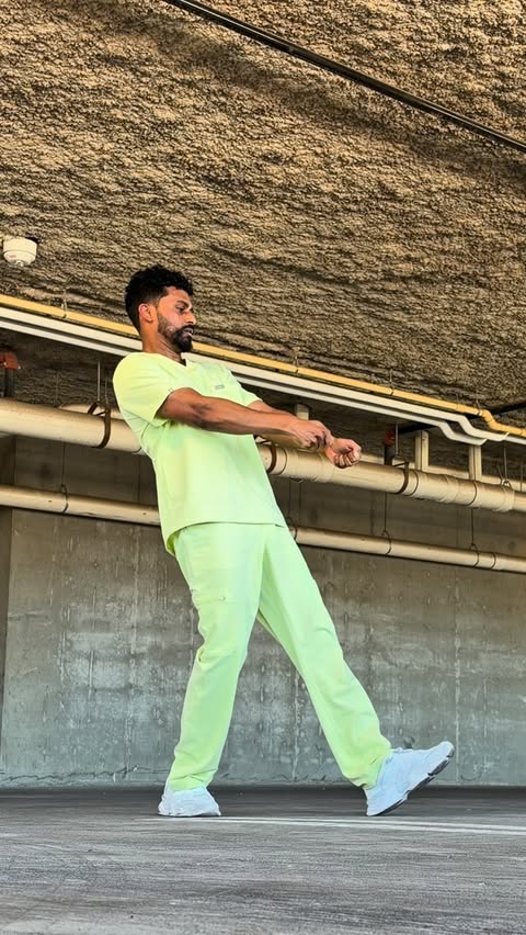 Instagram post by @thedancindentist for FIGS. Caption reads: [...] @thekidlaroi Scrubs: Sea Mist line -....
