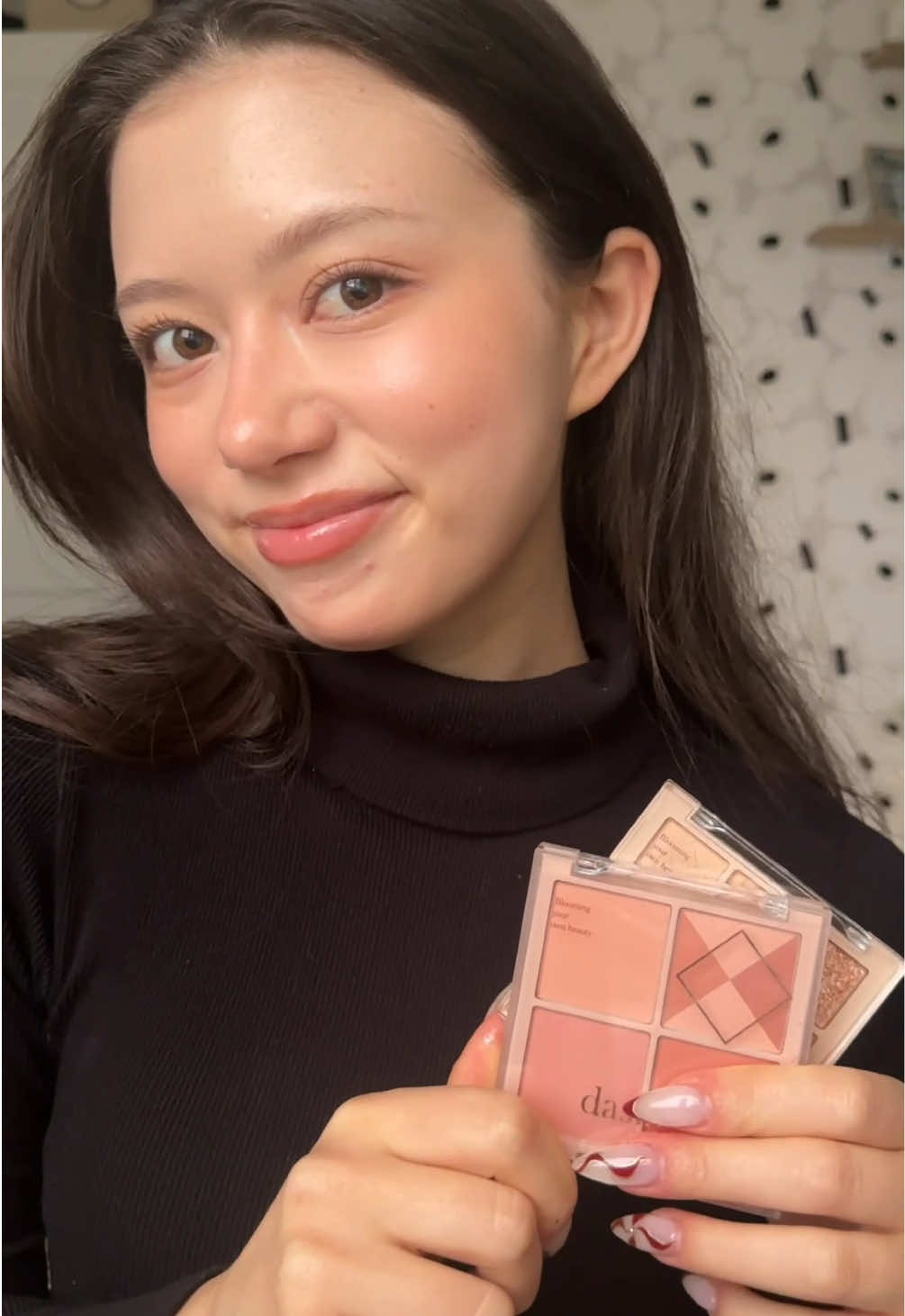 TikTok post by @ami.n99 for Dasique. Caption reads: [sponsored] toasty holiday makeup w/ @dasique....