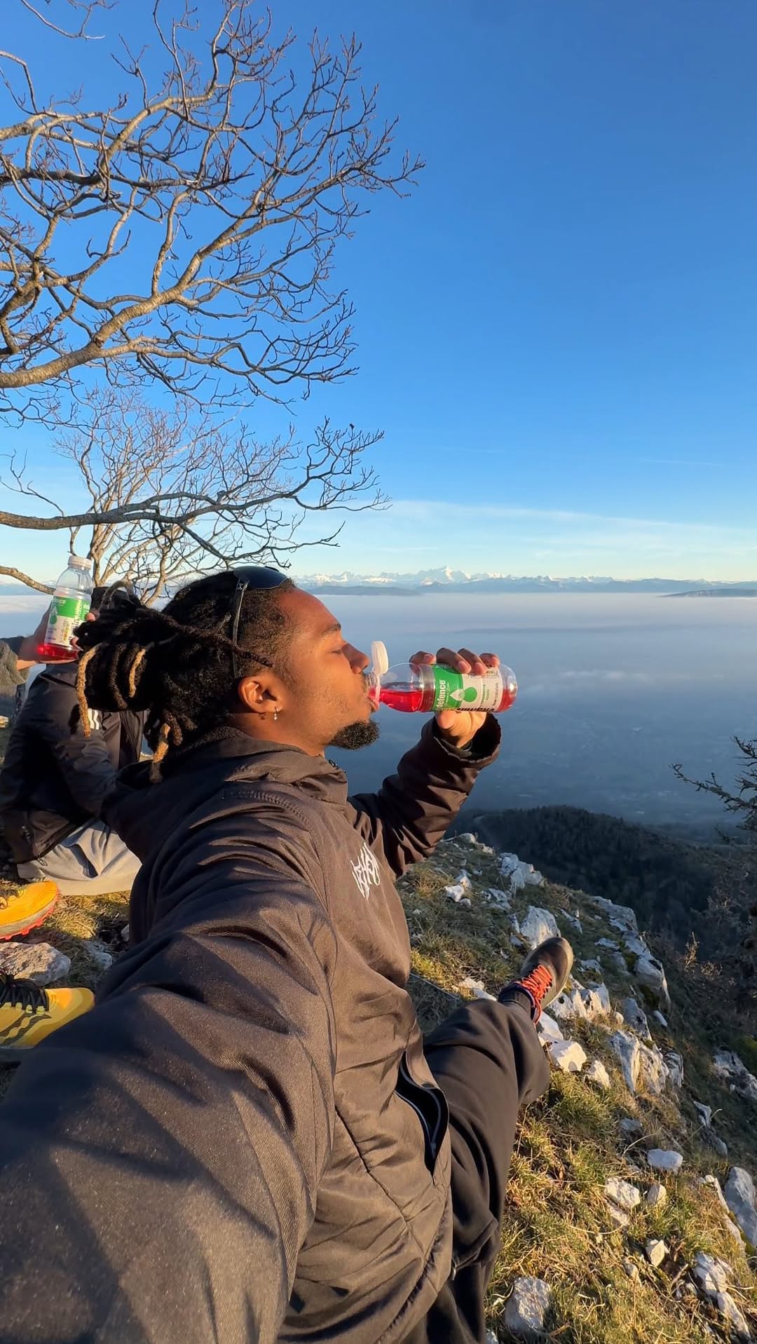 Instagram post by @nelsonlouiis for vitaminwater. Caption reads: Friends, nature and staying active with my....