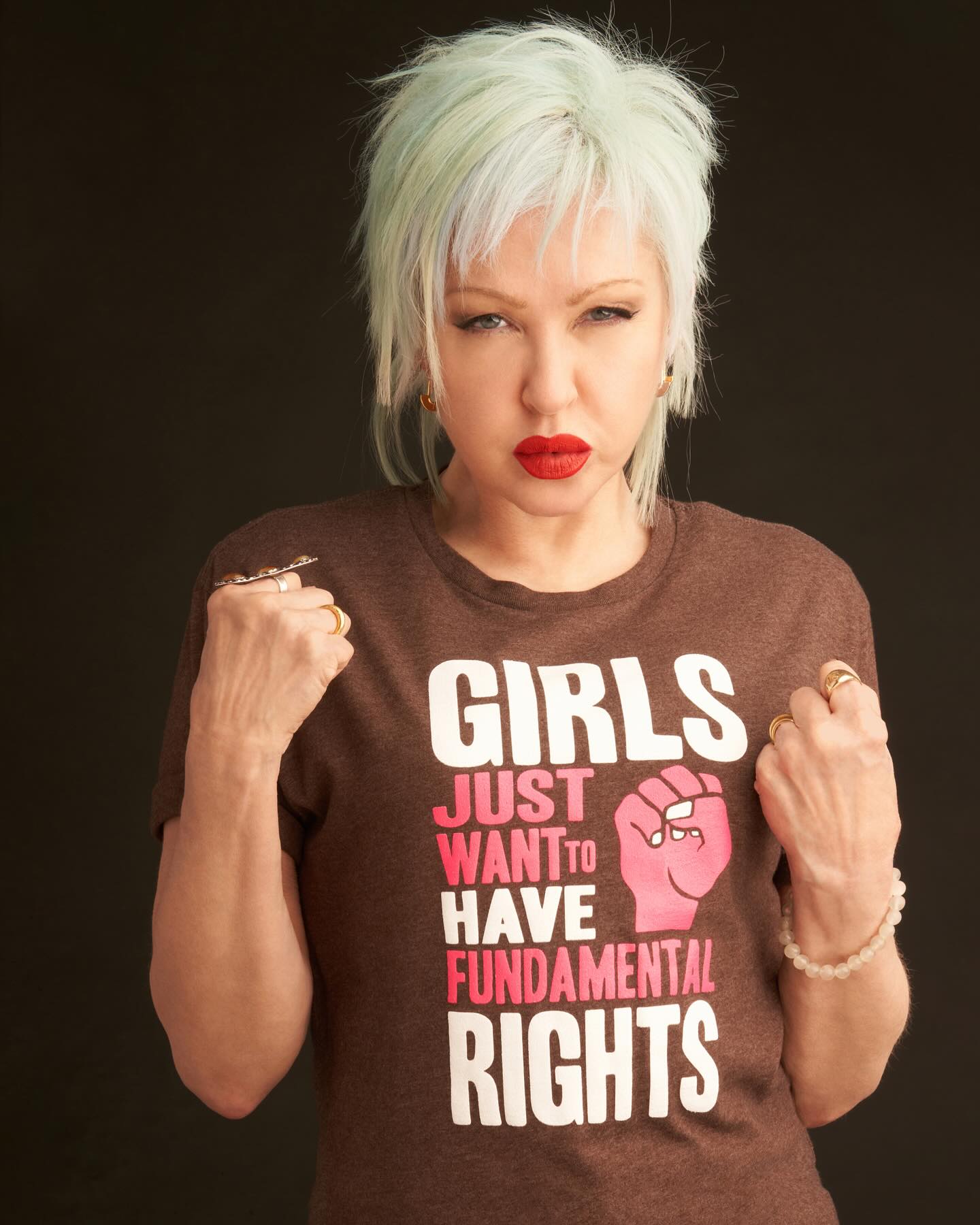 Instagram post by @cyndilauper for Bonfire. Caption reads: Join me in the fight for women’s rights and....