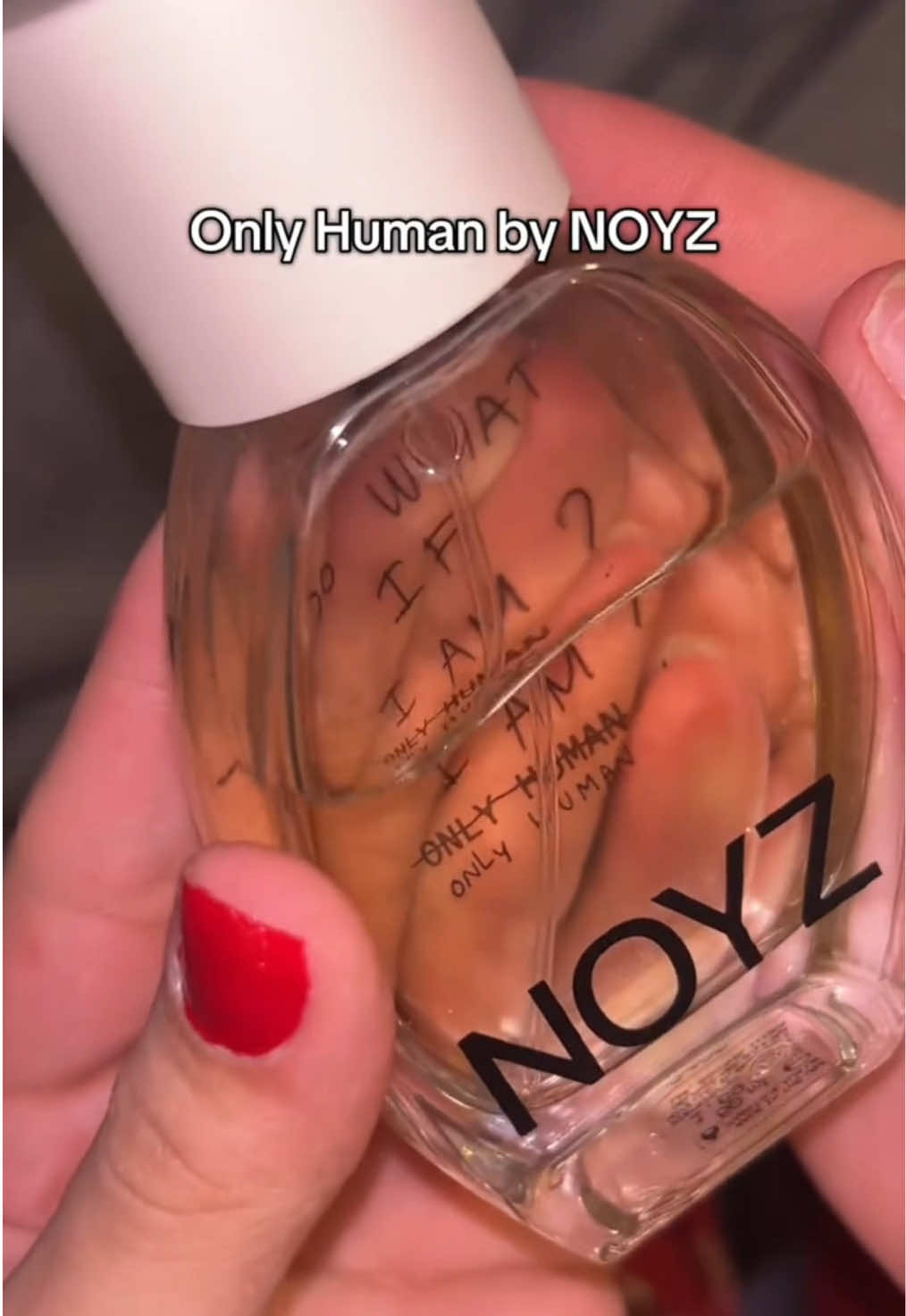 TikTok post by @definitelynotdrana for NOYZ. Caption reads: [...] need another bottle!!😍 @noyzfragrance #noyz....