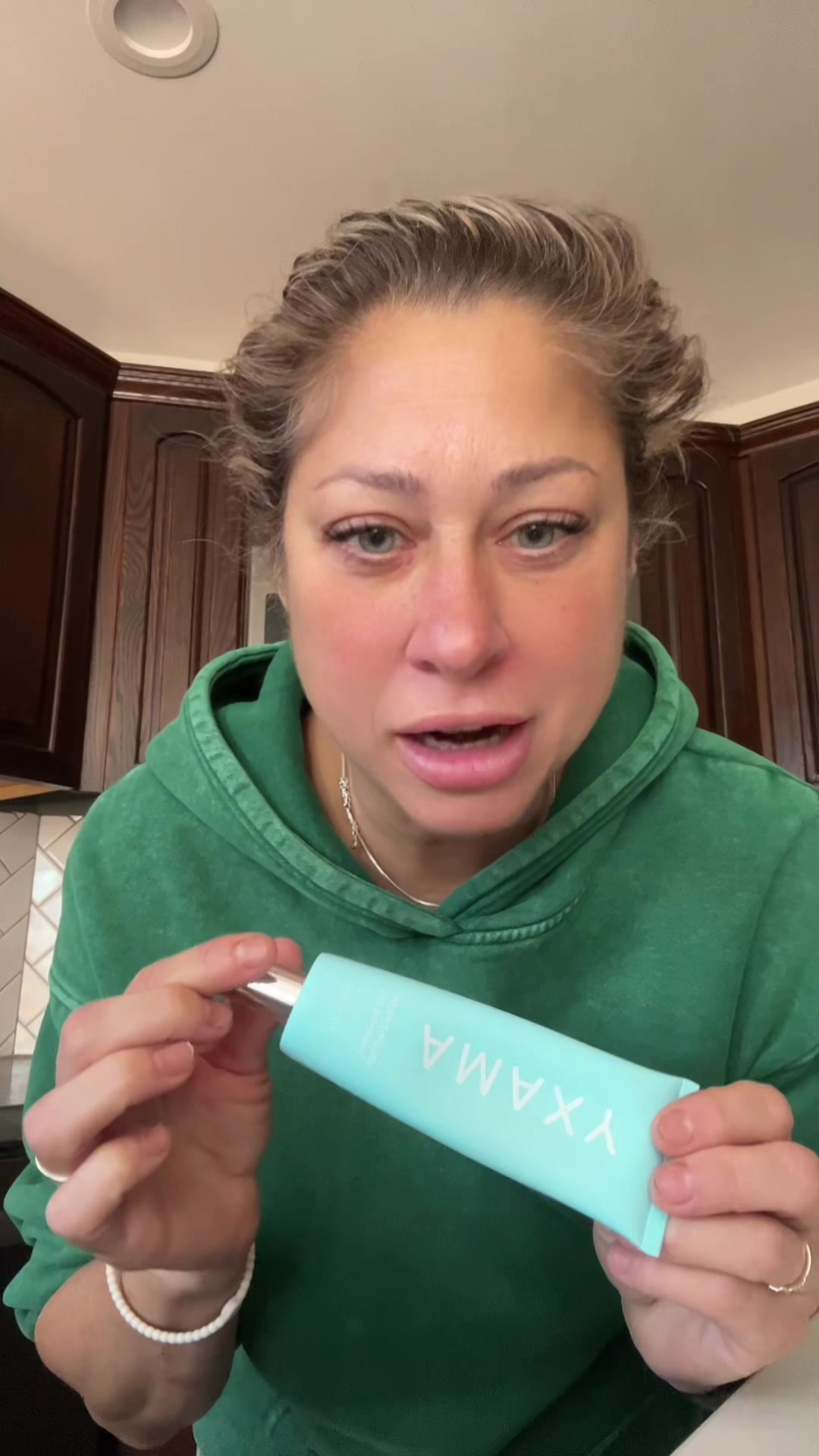 TikTok post by @therealchristinagia for AMAXY Beauty. Caption reads: @AMAXY Haircares .