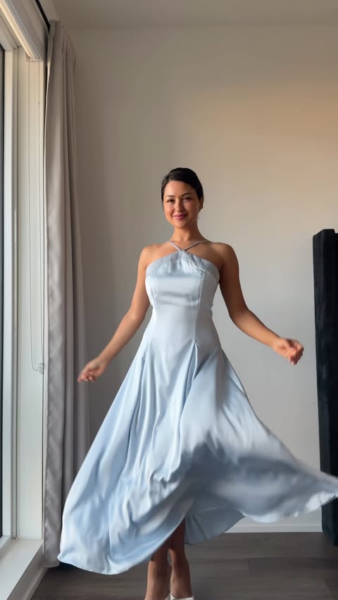 Instagram post by @katieomari for Rihoas. Caption reads: Blue 🩵 20% off KATIEOM20 Dresses from....