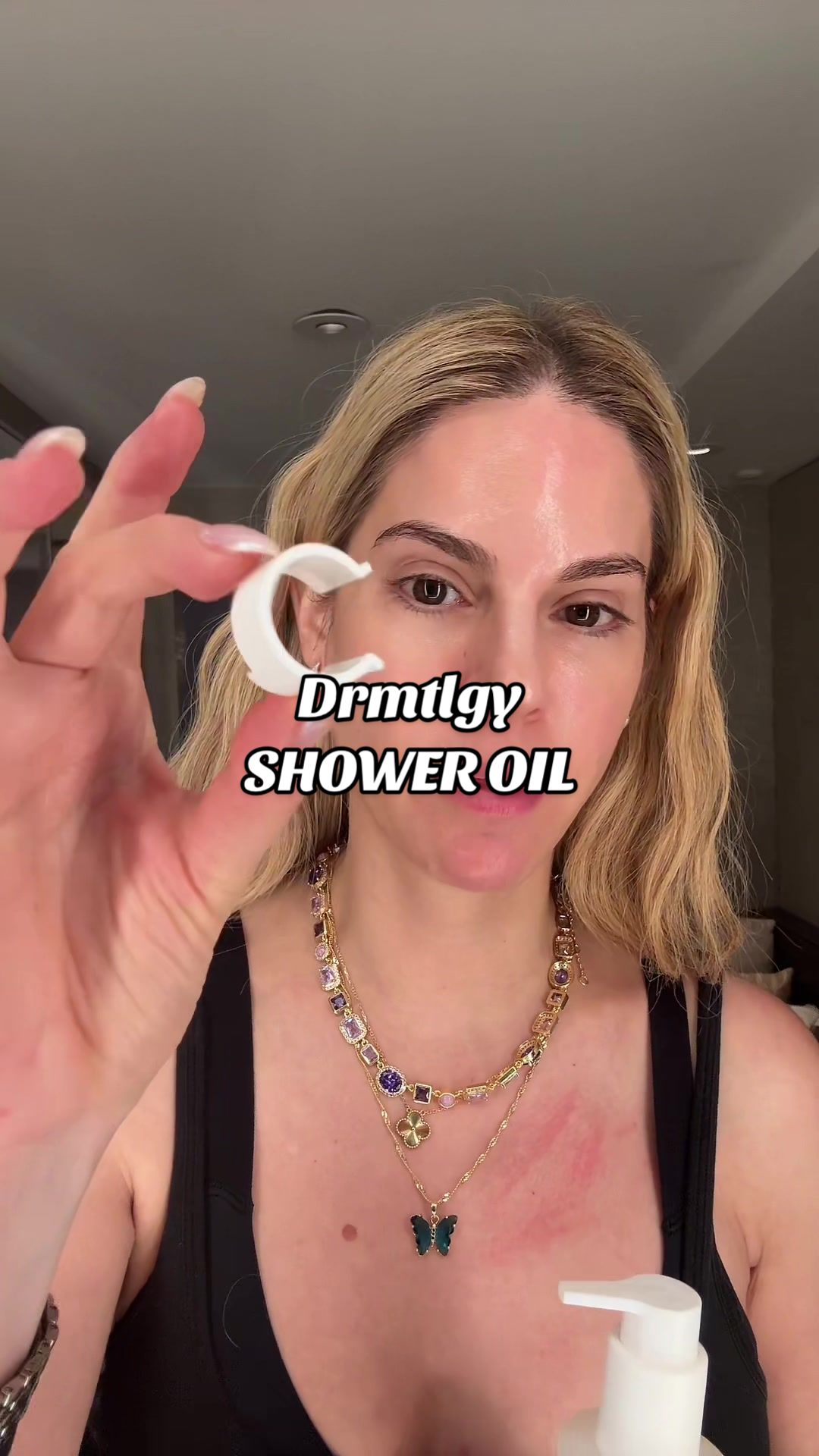 TikTok post by @kellykrugerbrooks for DRMTLGY. Caption reads: I chose @DRMTLGY and u should too! #shower [...].