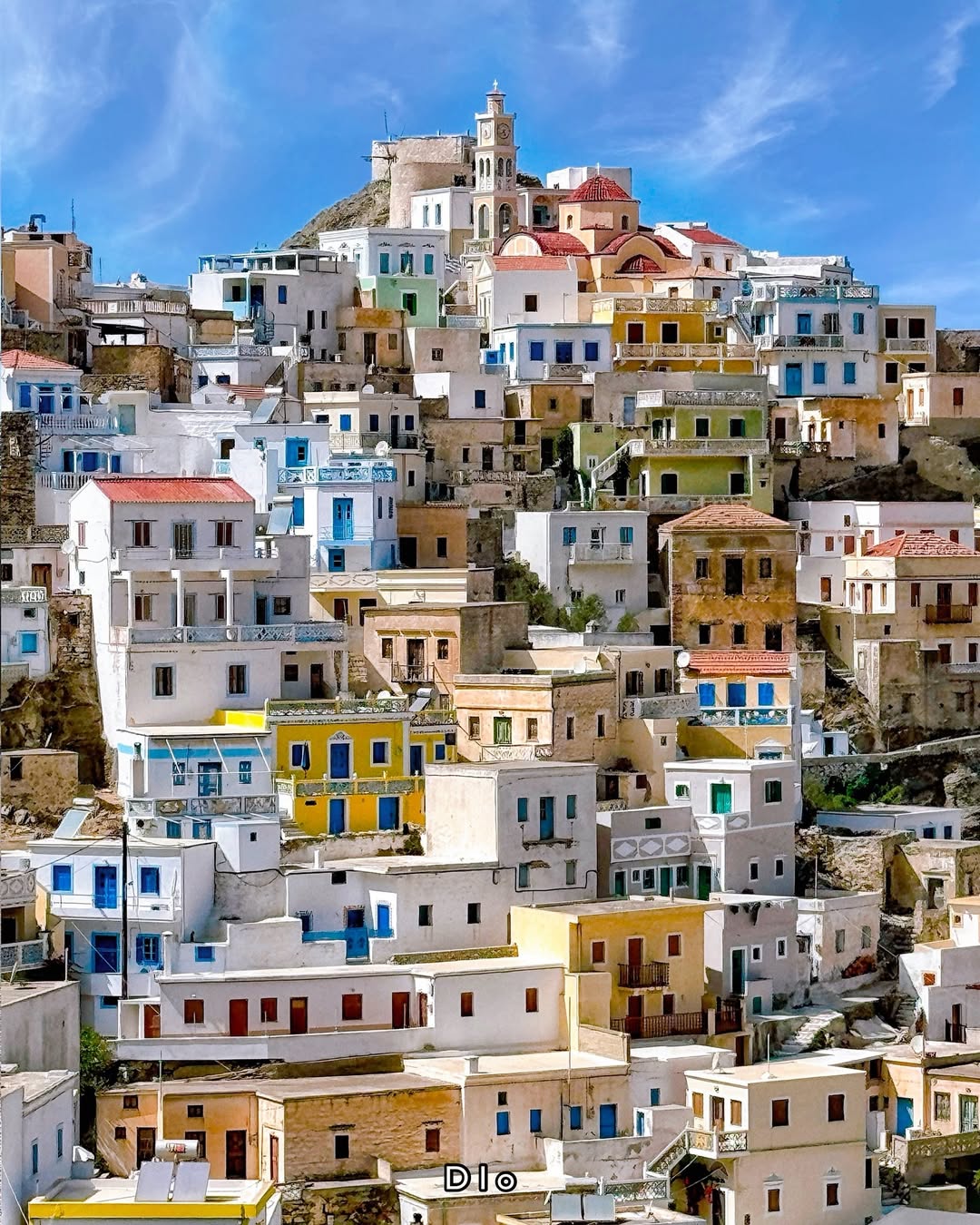 Instagram post by @diokaminaris for Visit Greece. Caption reads: The beauty of a place 
📍Olympos Medieval village,....