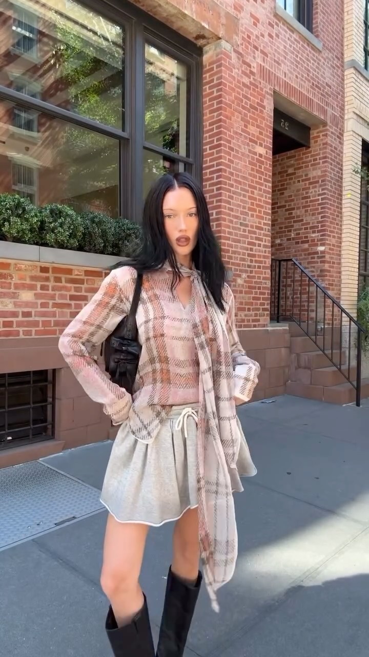 Instagram post by @meredithduxbury for Acne Studios. Caption reads: out and about @acnestudios.