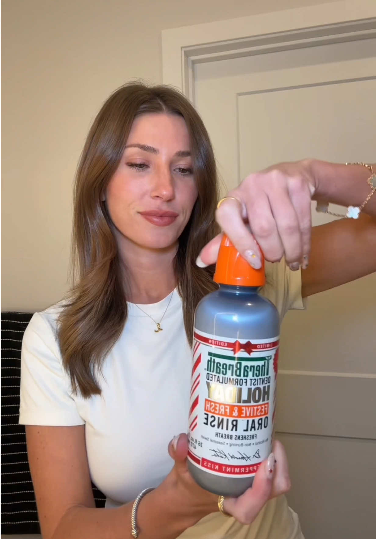 TikTok post by @emily_stonee for TheraBreath. Caption reads: Loving this festive @TheraBreath US flavor in....