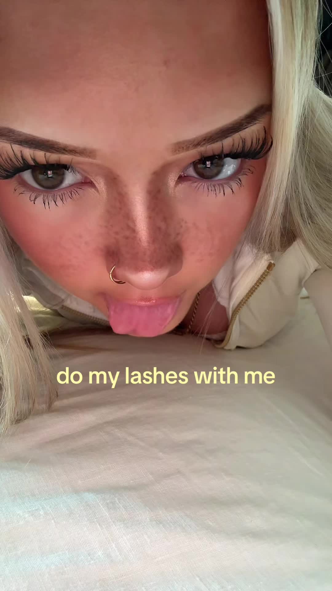 TikTok post by @_ruebaker for Amzgirlofficial. Caption reads: do my lashes with me @amzgirlofficial....
