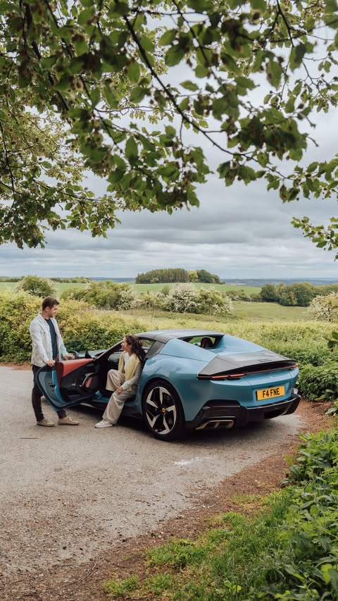 Instagram post by @keikeiandlewis for Ferrari. Caption reads: [...] day. Getting lost together in the Ferrari....