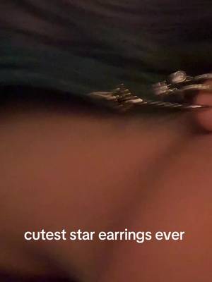 TikTok post by @overratedgirll for Oufer Body Jewelry Official. Caption reads: i love them #earrings #oufer #dangle #fyp #viral....