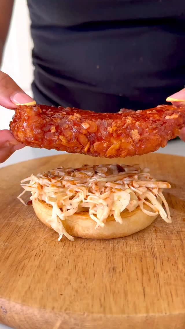 Instagram post by @foodie_lilly for Aldi UK. Caption reads: Honey + Sriracha Chicken Burger with Sticky Garlic....