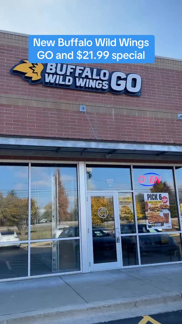 Instagram post by @bored_in_chicago for Buffalo Wild Wings. Caption reads: A brand-new Buffalo Wild Wings GO just opened in....