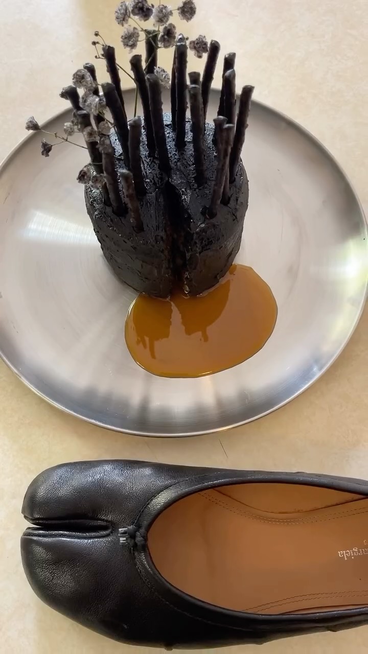 Instagram post by @lvebriaaa for GOAT. Caption reads: Something divine with @lvebriaaa and the Margiela....