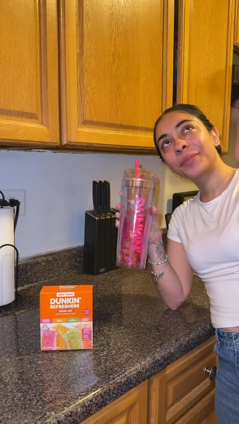 Instagram post by @lemmeemmy for Singles To Go. Caption reads: [...] and #PocketYourDunkin 🧡 #ad @dunkin....