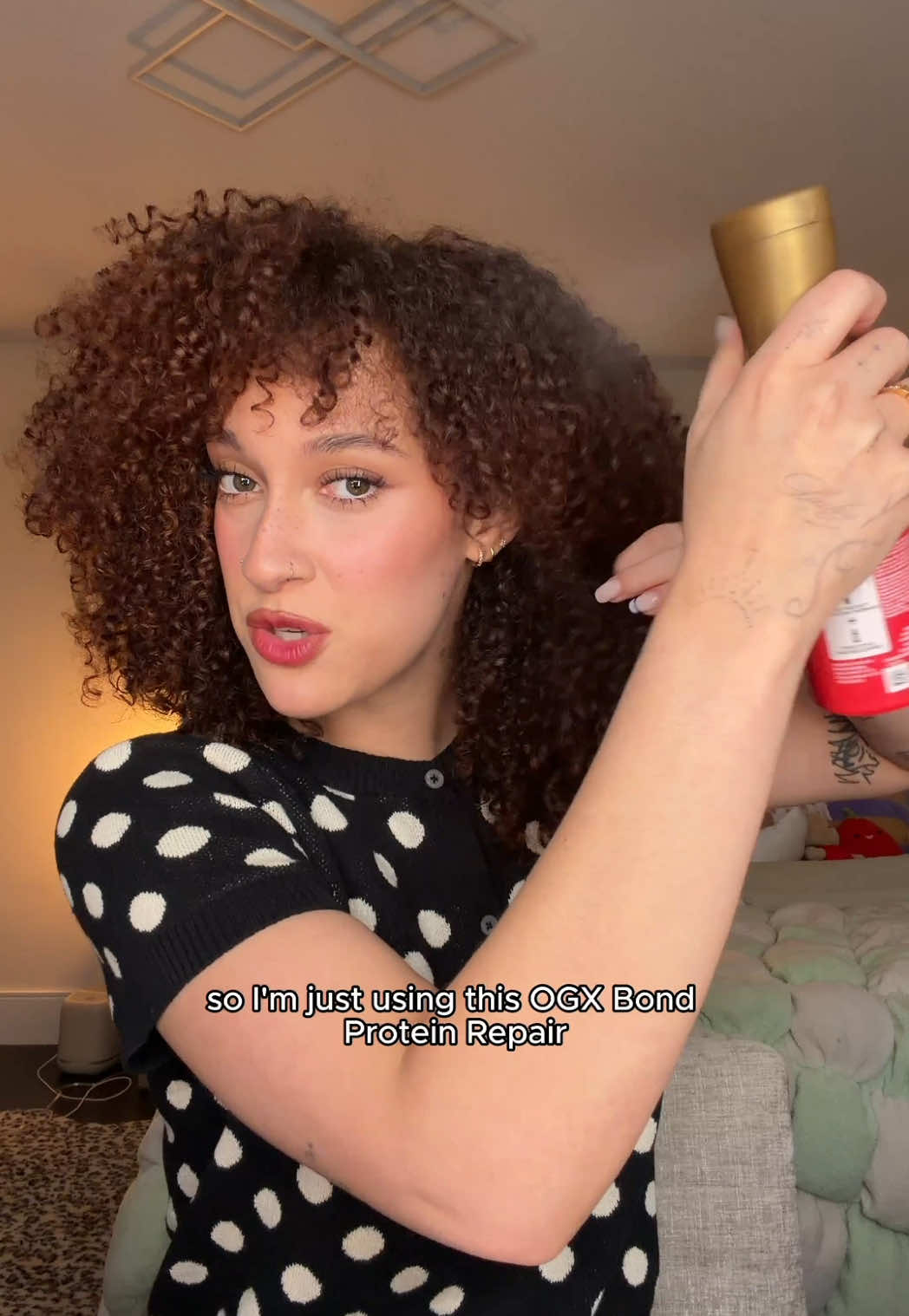 TikTok post by @trulue for OGX Beauty. Caption reads: THIS IS THE HOLIDAY HAIRSTYLE FOR ME!! ✨  I’ll be....