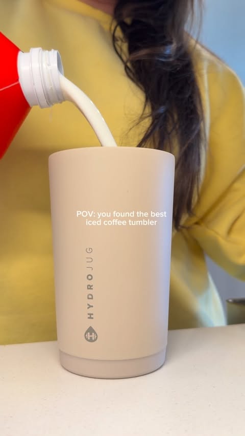 Instagram post by @fifiimarie for HYDROJUG. Caption reads: sooo obsessed with my new ice coffee tumbler from....