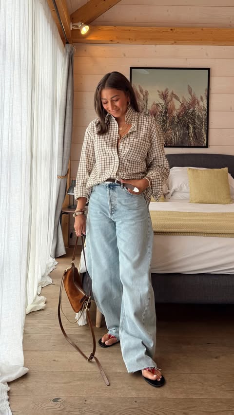 Instagram post by @motherhood_styled for Mango. Caption reads: [...] with me🤪… #motherhood Check Mate 🏁 @mango....