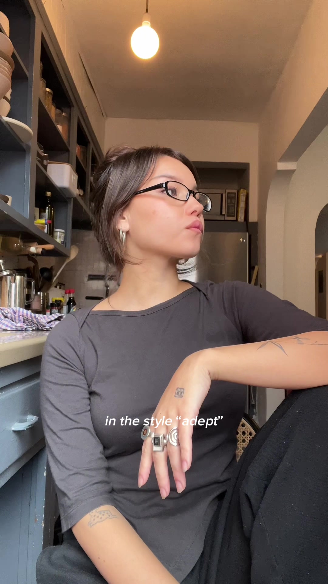 TikTok post by @emmyqandrews for Eyebuydirect. Caption reads: Refreshing my rotation with @Eyebuydirect’s deals....