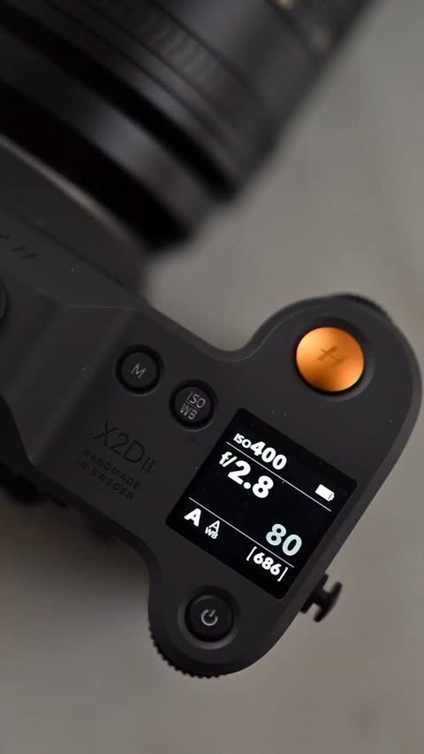 Instagram post by @taylorjackson for Hasselblad. Caption reads: The @hasselblad X2D II and the 35-100E #ad....