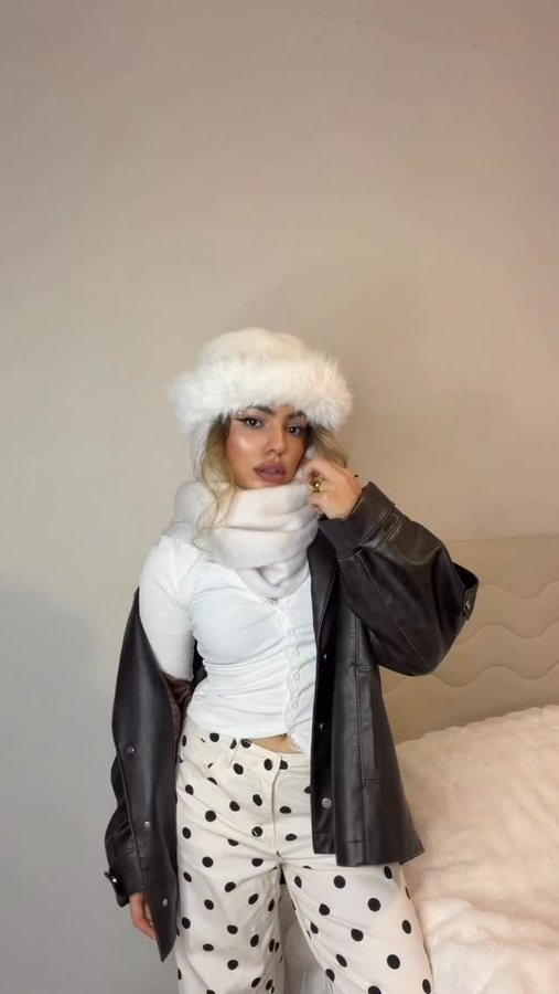 Instagram post by @zaalishvili_zalina for Fabrique. Caption reads: 🥥🤍.