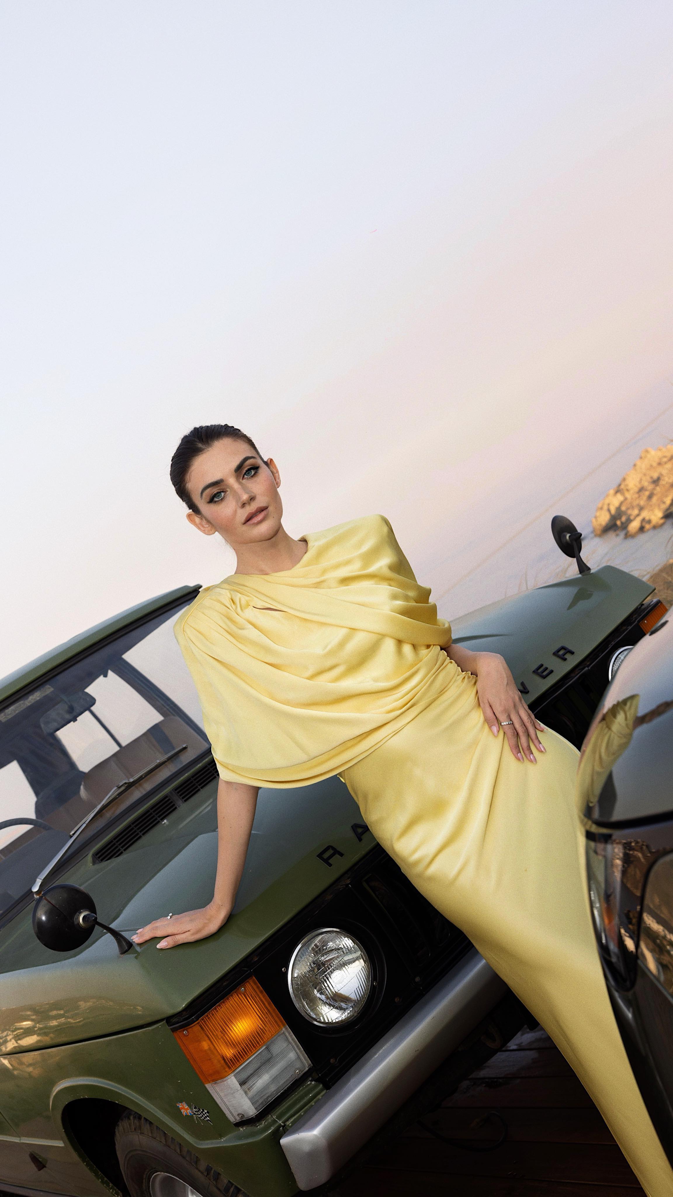 Instagram post by @floradallevacche for Land Rover. Caption reads: Celebrating 55 years of @rangerover in Mykonos,....