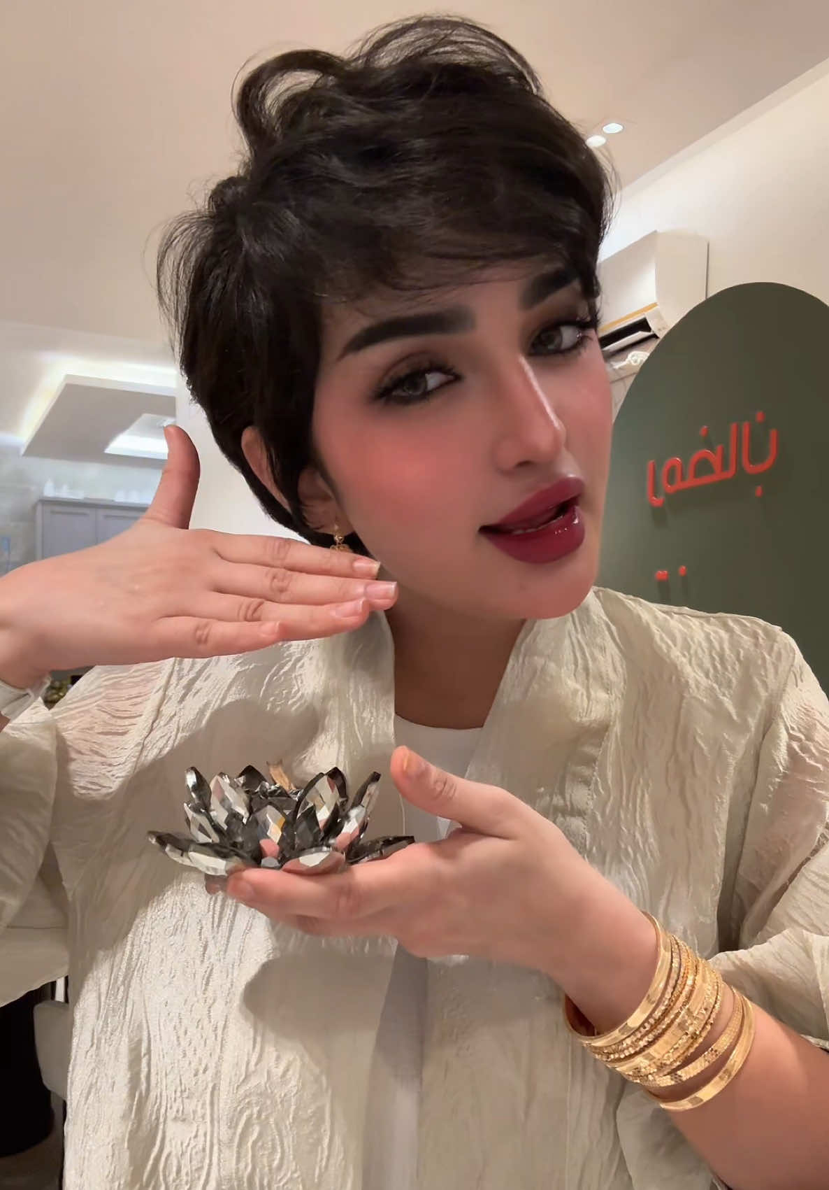 TikTok post by @miuoshah for Option B. Caption reads: @اوبشن بي ( كود الخصم : M20) اطلبو بي ماجيك....
