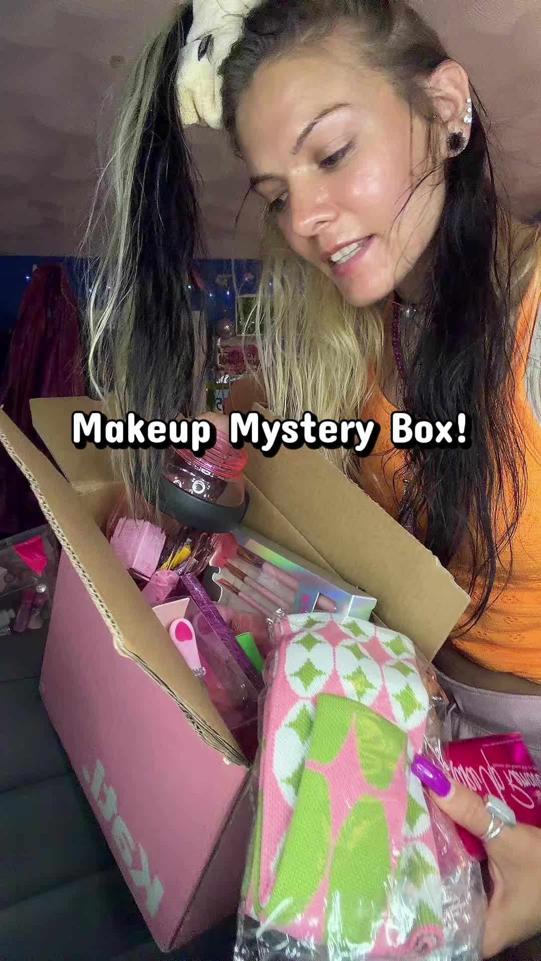 TikTok post by @stacybazilchuck for Kati Beauty NYC. Caption reads: [...] makeup in this makeup mystery box! @Kati....