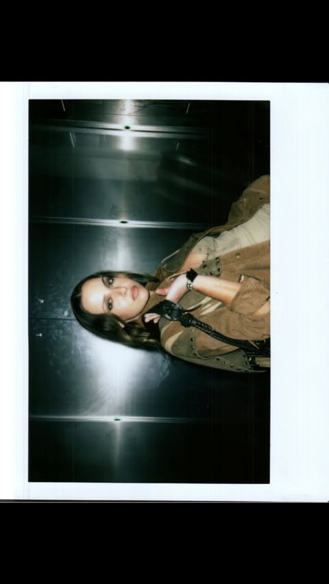 Instagram post by an influencer for NET-A-PORTER. Caption reads: [...] FW26 show with @netaporter 🖤 📹 @warwann_....