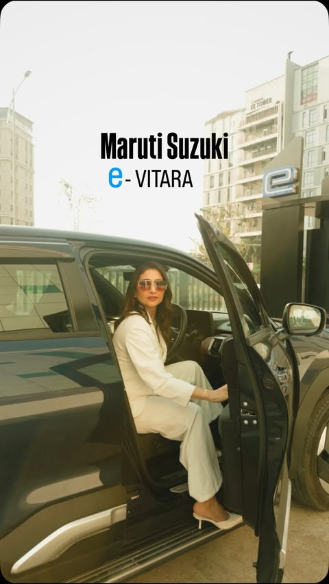 Instagram post by @garima_banka for Maruti Suzuki. Caption reads: [...] ⚡ That’s the thing about the Maruti Suzuki e....