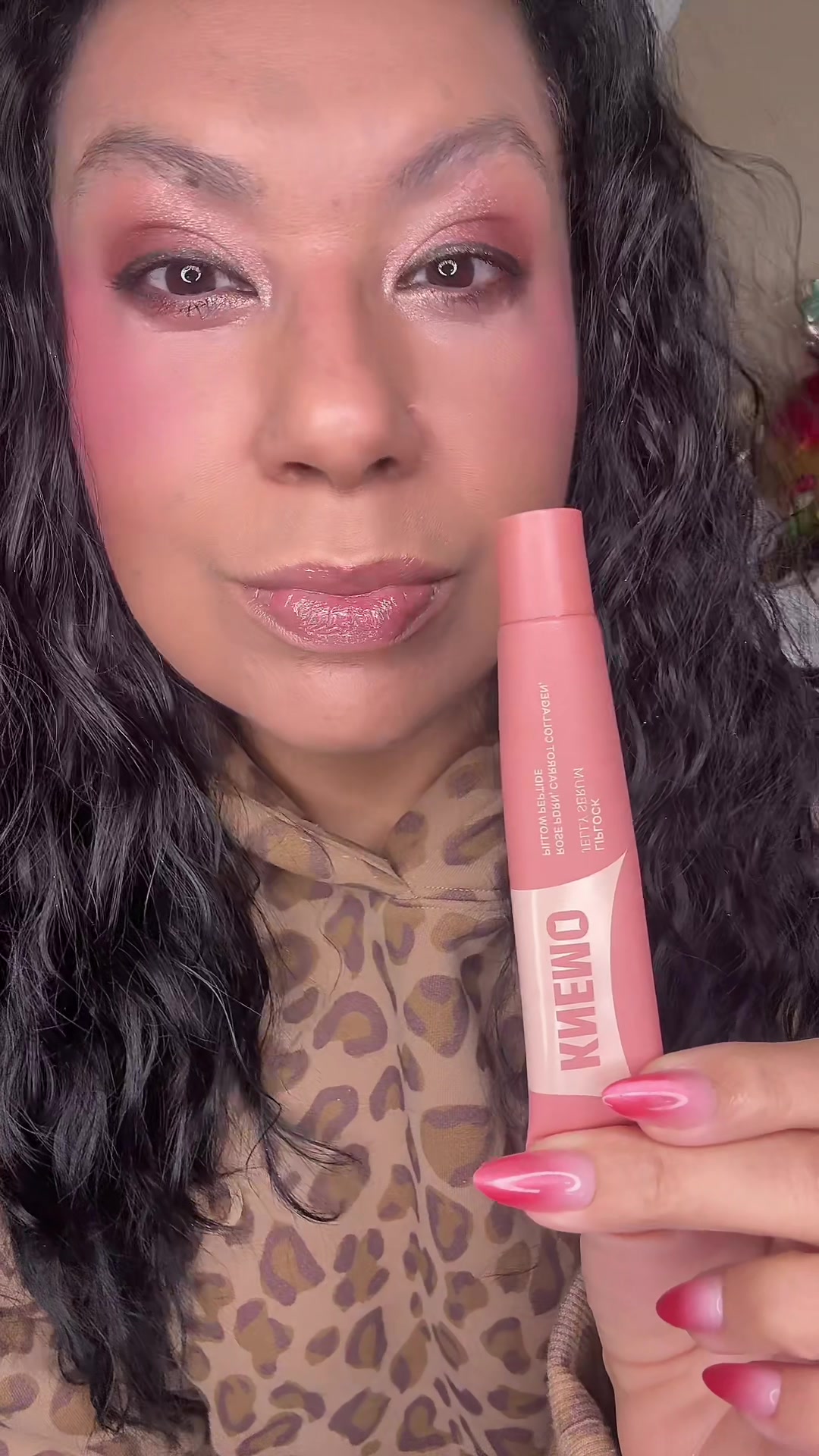 TikTok post by @alovelyflame for Knemo Beauty. Caption reads: @KNEMO™ #knemo #lipgloss #lipglosspoppin #gloss....