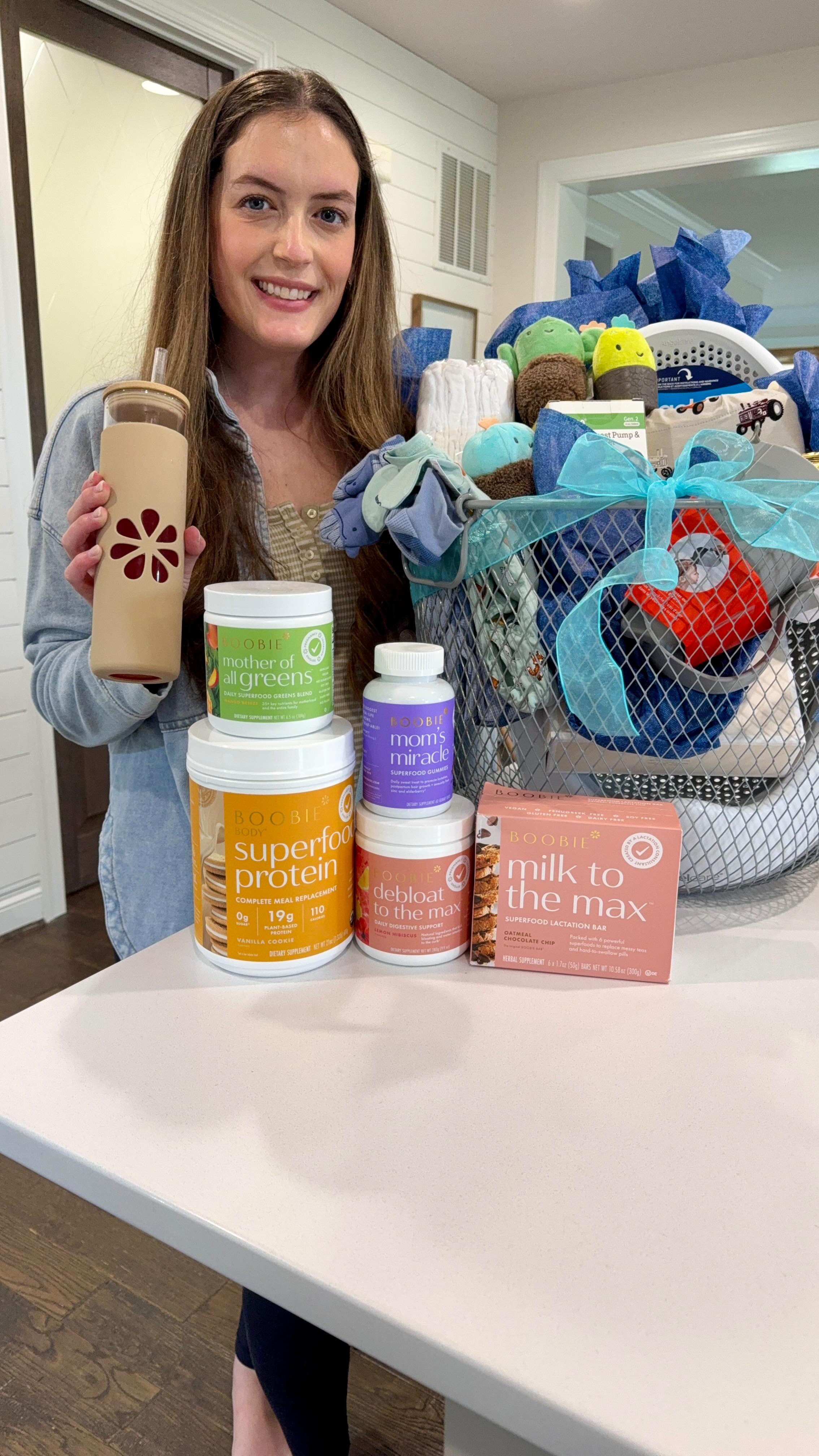 Instagram post by @melissathompsonhome for Boobie Superfoods. Caption reads: [...] a baby shower basket with me and....