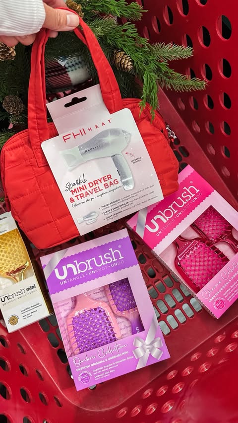 Instagram post by @lovetotarget for FHI Heat. Caption reads: GIFTS FOR HER 🩷 New holiday gift sets from....