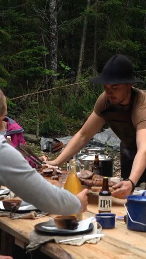 Instagram post by @erikgrankvist_ for RevolutionRace. Caption reads: Smoking wild boar at the log cabin 🔥🐗
Wild game....