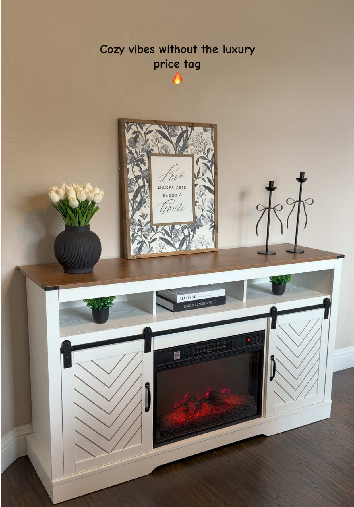 TikTok post by @eshmitaeshu for Royalcraft. Caption reads: [...] grab this tv stand with fireplace 🥰....