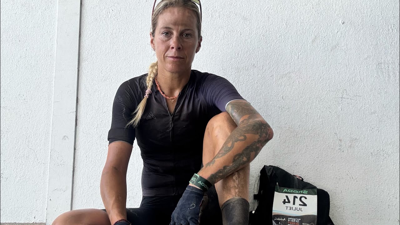 YouTube post by @JulietElliottsChannel for Hiplok. Caption reads: Pushing My Limits in 37°C! 4-Day Titan Desert....