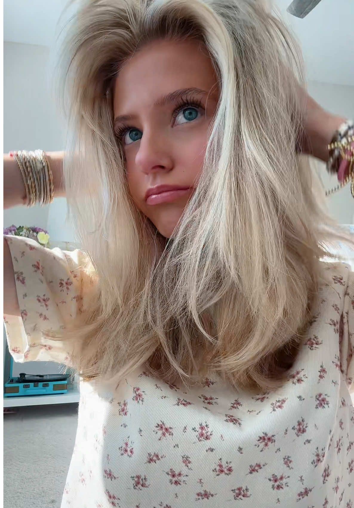 TikTok post by @keekswrld for Living Proof. Caption reads: gifted by Living Proof  my biggest hair volume....