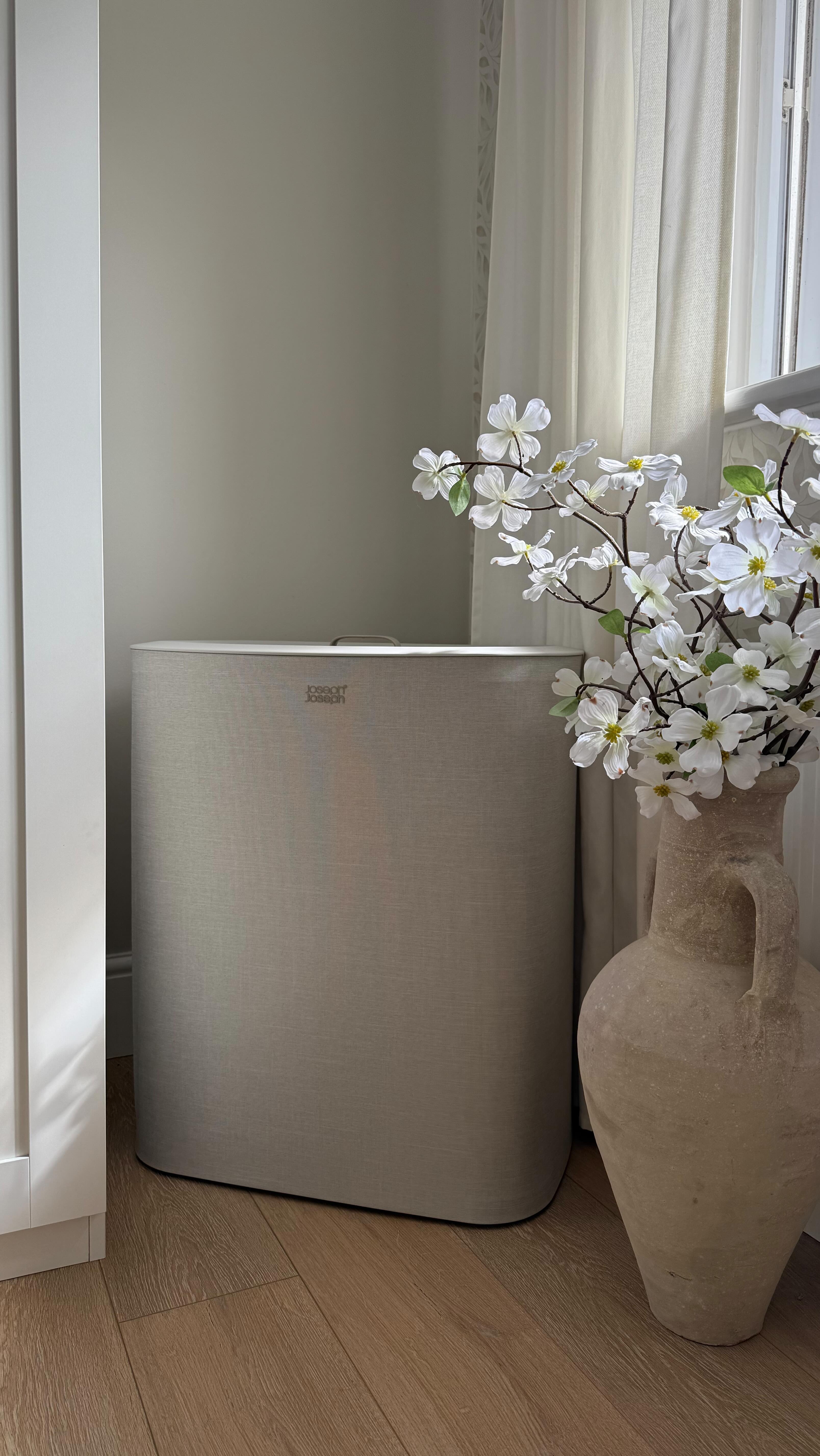 Instagram post by @homepoppylane for Joseph Joseph. Caption reads: Laundry game = changed 🙌 

Ad The....