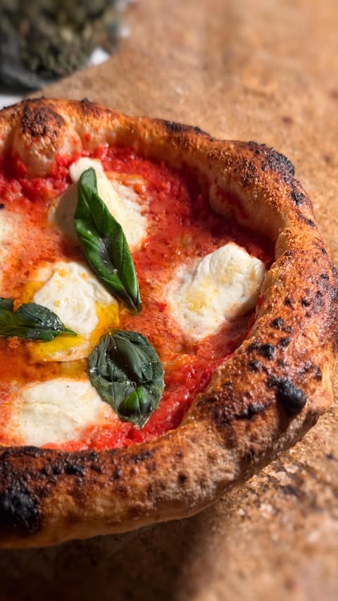 Instagram post by @dough_and_behold for Ooni. Caption reads: ✈️🍕✈️

About to fly back to London from an....