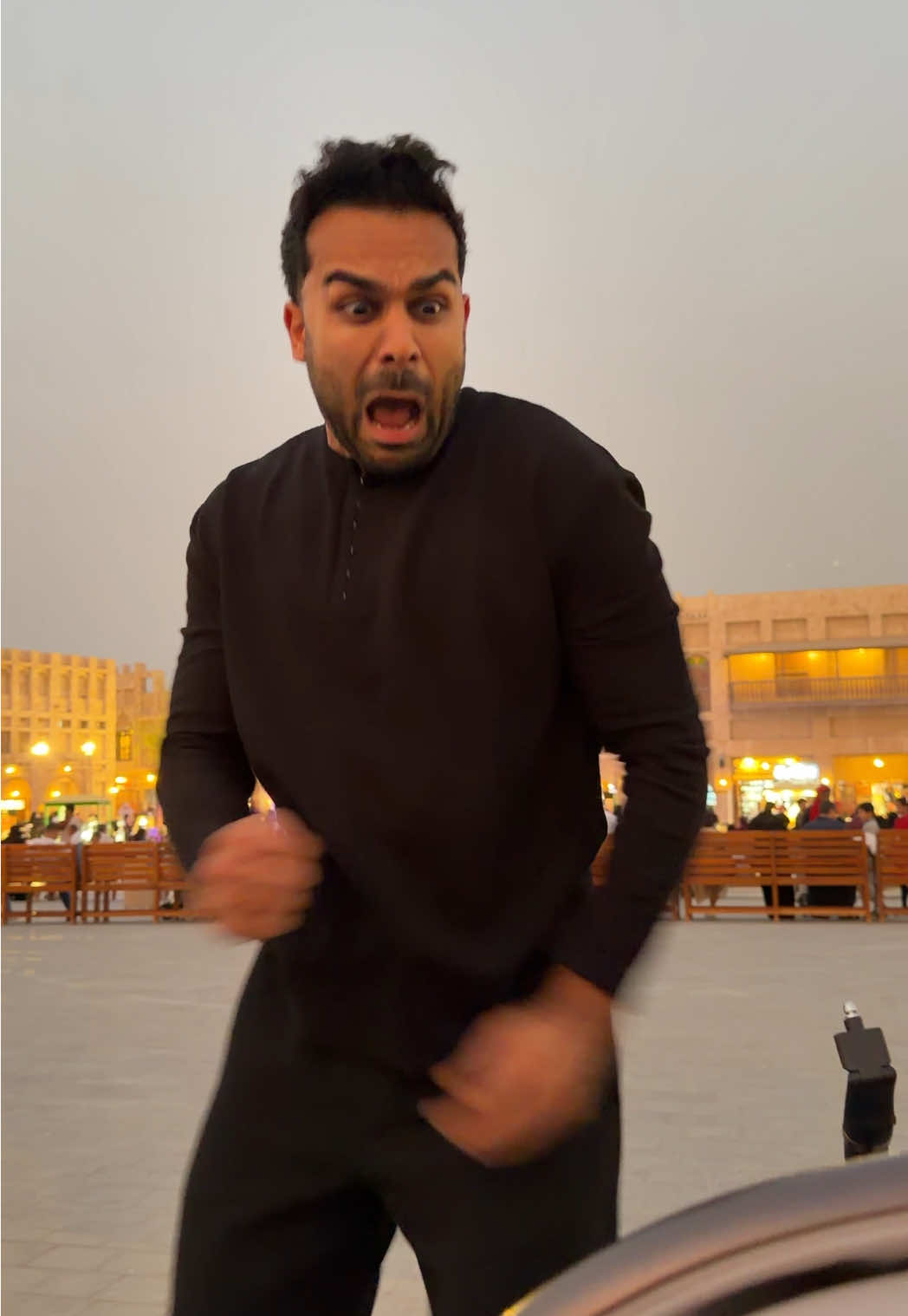 TikTok post by @adamw for Visit Qatar. Caption reads: When u bump into the wrong person @Visit Qatar....